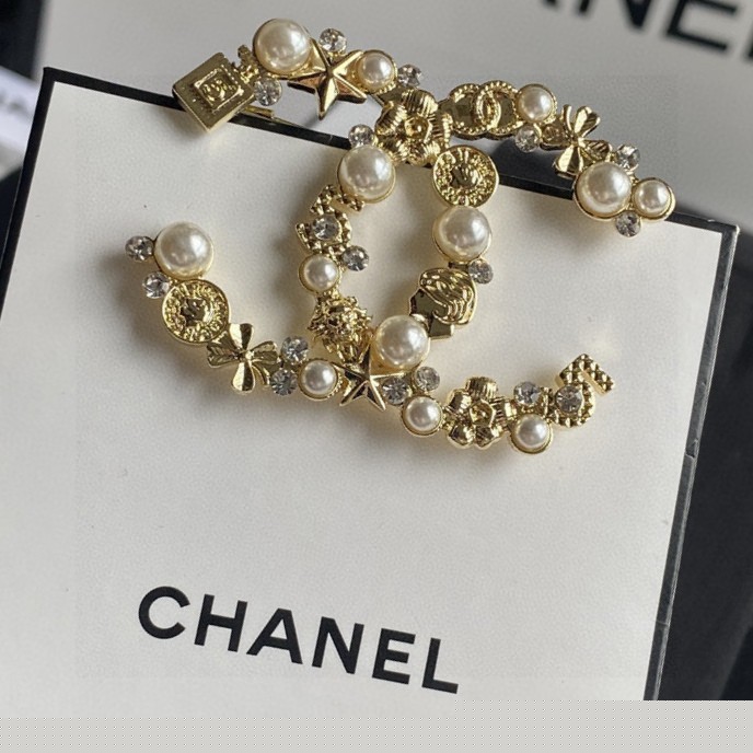 Ch*el brooches